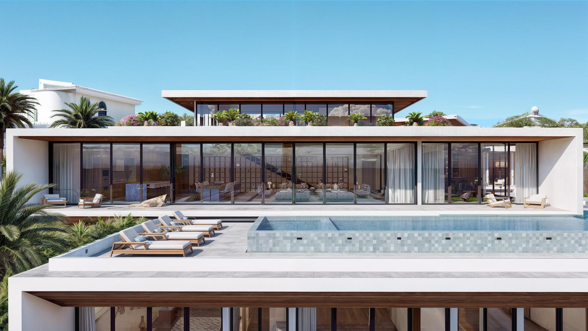 Villa del León daytime exterior in Pedregal, Cabo — infinity pool and sun loungers